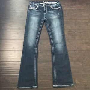 Medium wash boot cut denim jeans